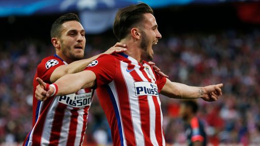 Saul Niguez celebrates with Koke after scoring the first goal for Atletico Madrid