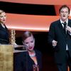 U.S. actress Johansson listens to U.S. director Tarantino after she was awarded with an Honorary award during the 39th Cesar Awards ceremony in Paris