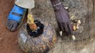 John Dimo, a traditional witch-doctor, performs an ancient rite with mystical artifacts to predict the outcome of the U.S. elections in Kogelo village, Nyangoma Kogelo, 430 km (367 miles) west of Kenya's capital Nairobi, November 5, 2012. Kogelo is the ancestral home of U.S. President Barack Obama. Dimo, about 115-years-old, says he knew Obama's father who was buried in the village in 1982. The former army officer says he inherited his trade as a witch-doctor from his father in 1962 and is certain his rite will help favour Obama in the U.S. elections. Four years ago, Kogelo, and Africa in general, celebrated with noisy gusto when Obama, whose father came from the scattered hamlet of tin-roofed homes, became the first African-American to be elected president of the United States. Looking across the Atlantic to the November 6 presidential election, the continent is cooler now towards the "son of Africa" who is seeking a second term. There are questions too whether his Republican rival, Mitt Romney, will have more to offer to sub-Saharan Africa if he wins the White House. To match Analysis AFRICA-USA/ELECTION REUTERS/Thomas Mukoya (KENYA - Tags: SOCIETY POLITICS ELECTIONS USA PRESIDENTIAL ELECTION) Published: Lis. 5, 2012, 3:42 odp.