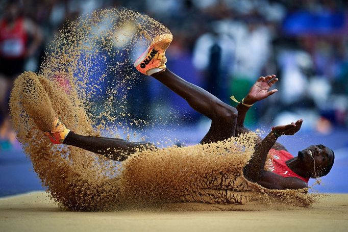 Paris 2024 Olympics - Athletics - Men's Triple Jump Qualification - Stade de France, Saint-Denis, France - August 07, 2024. Andy Hechavarria of Cuba in action. REUTERS/Dy