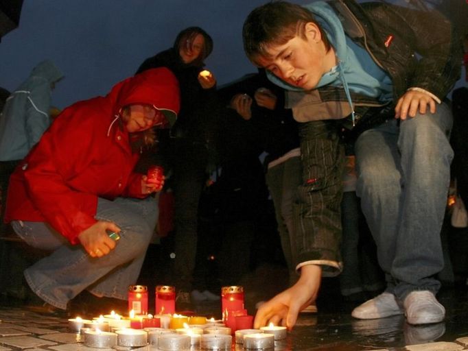 People light candles during a demonstration of solidarity with the family of Josef Fritzl in the centre of Amstetten April 29, 2008. DNA tests have shown that Austrian Fritzl, who had kept his daughter prisoner for 24 years and abused her sexually, was the father of her six surviving children, police said on Tuesday. REUTERS/Heinz-Peter Bader (AUSTRIA)