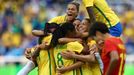 Brazil's squad celebrate their first goal.