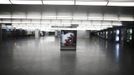 An advertising board is seen at a nearly empty arrival hall at Atocha rail station during a 24-hour nationwide general strike in Madrid, November 14, 2012. Spanish and Portuguese workers staged the first coordinated strike across the Iberian peninsula on Wednesday, shutting down transport, grounding flights and closing schools to protest austerity measures and tax hikes. REUTERS/Paul Hanna (SPAIN - Tags: POLITICS CIVIL UNREST BUSINESS EMPLOYMENT TRANSPORT) Published: Lis. 14, 2012, 8:56 dop.