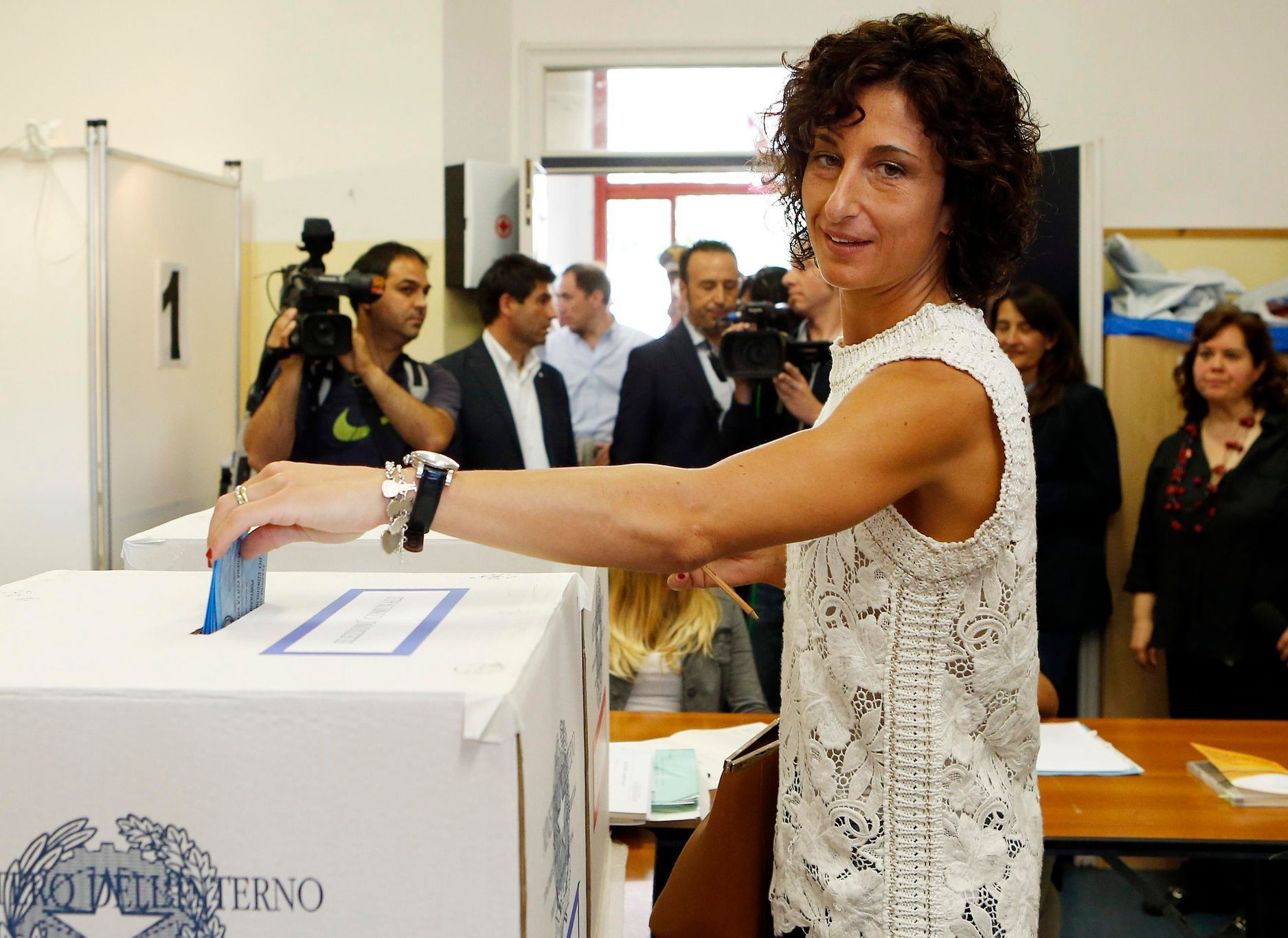 Agnese Renzi, wife of the Italian Prime Minister Matteo Renzi, casts her vote during the European Parliament elections in a polling station in Pontassieve