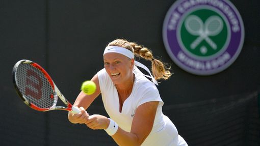 Petra Kvitová v zápase proti Jekatěrině Makarovové na Wimbledonu 2013