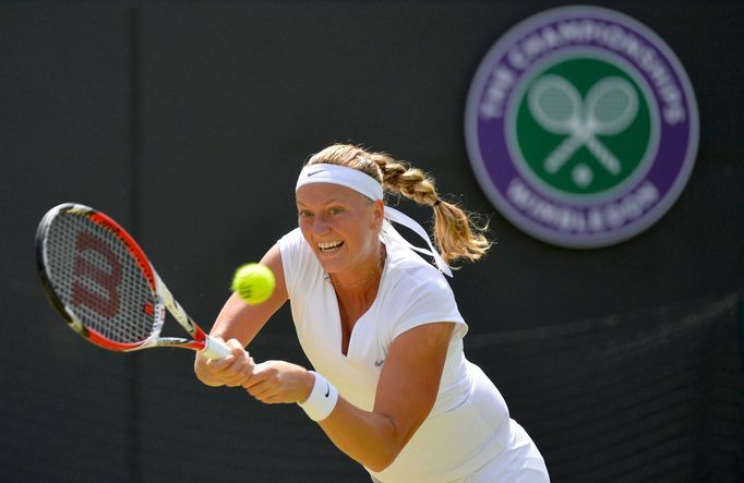 Petra Kvitová v zápase proti Jekatěrině Makarovové na Wimbledonu 2013