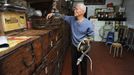 TO GO WITH Lifestyle-medicine-health,FEATURE by Joyce Woo This photo taken on January 31, 2011 shows "Big Snake Mak" -- otherwise known as serpent salesman Mak Tai-kwong, taking snakes out of a basket at the She Wong Lam snake soup shop in Hong Kong. Snake has been used in China for thousands of years to cure a host of ailments -- snake-fermented wine for arthritis, snake genitals for the kidneys and male sex drive, snake gall bladder for bronchitis.