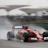 Ferrari Formula One driver Raikkonen of Finland drives during the qualifying session for the Chinese F1 Grand Prix at the Shanghai International circuit