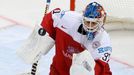 Denmark's goalie Simon Nielsen eyes the puck during the first period of their men's ice hockey World Championship Group A game against the Czech Republic at Chizhovka Are