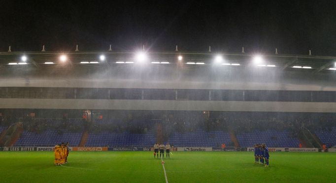 FA Cup First Round Replay - SportsDirect.com Park - 17/11/15 Mansfield Town and Oldham Athletic players during a minute's silence in memory of the Paris attacks before th