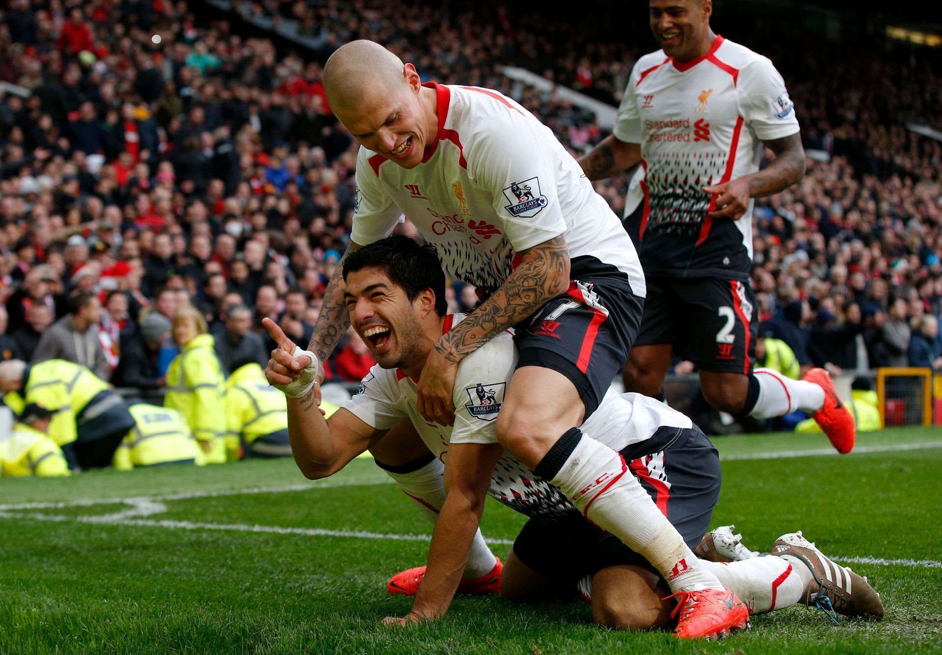 Liverpool's Suarez celebrates his goal against Manchester United with Skrtel during their English Premier League soccer match in Manchester