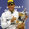 Mercedes Formula One driver Lewis Hamilton of Britain holds his trophy after winning the Bahrain F1 Grand Prix at the Bahrain International Circuit (BIC) in Sakhir