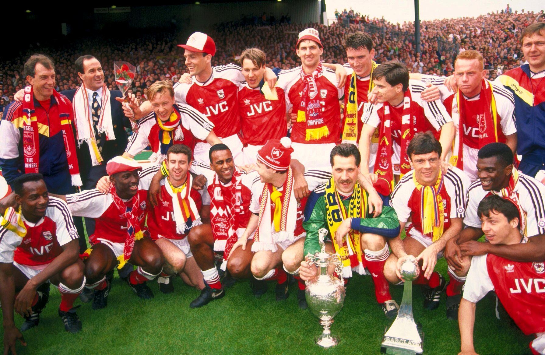 FILE PHOTO: Arsenal manager George Graham celebrates with his players after they clinched their second League Championship in three years, finishing above holders Liverpool.
