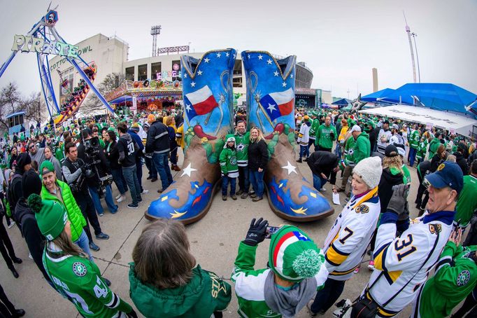 Jan 1, 2020; Dallas, Texas, USA; A view of the Dallas Stars fans and Nashville Predators fans and the fair park midway and the rides and Big Tex cowboy boots before the 2