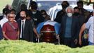 Friends and family carry the casket of soccer legend Diego Armando Maradona, at the cemetery in Buenos Aires, Argentina, November 26, 2020. REUTERS/Agustin Marcarian