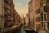 Kanál Oudezijds Kolk v Amsterdamu, jehož historie sahá až do středověku na fotografii z let 1890 až 1900.