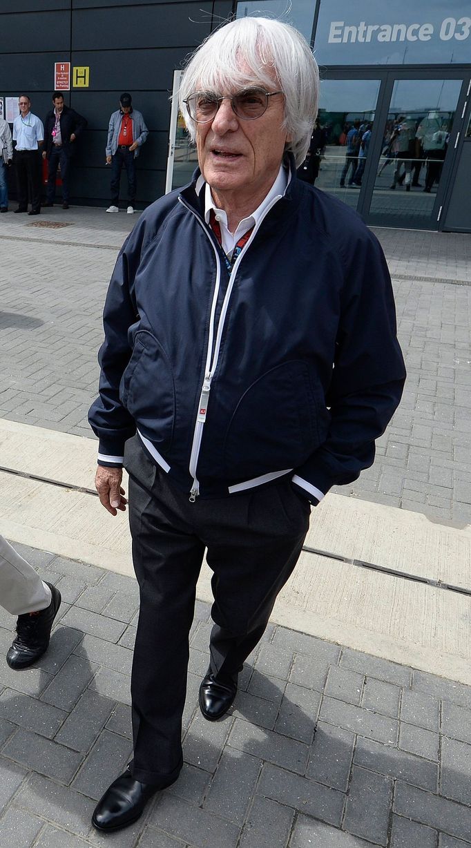 Formula One CEO Bernie Ecclestone reacts ahead of the British Grand Prix at the Silverstone Race circuit, central England, June 29, 2013. REUTERS/Nigel Roddis (BRITAIN -