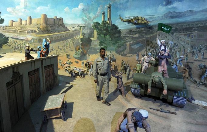 Image: 0127533279, License: Rights managed, An employee of the Manzar-e-Jahad (Jihad Museum) poses in front of a diorama depicting the Mujahedin war against the Soviet Union in Herat on April 27, 2012. The museum commemorates the 1979 uprising of Heratis against Soviet political advisors in the city and the ensuing Afghan conflict with the Russians., Place: AFGHANISTAN, Model Release: No or not aplicable, Credit line: Profimedia.cz, AFP