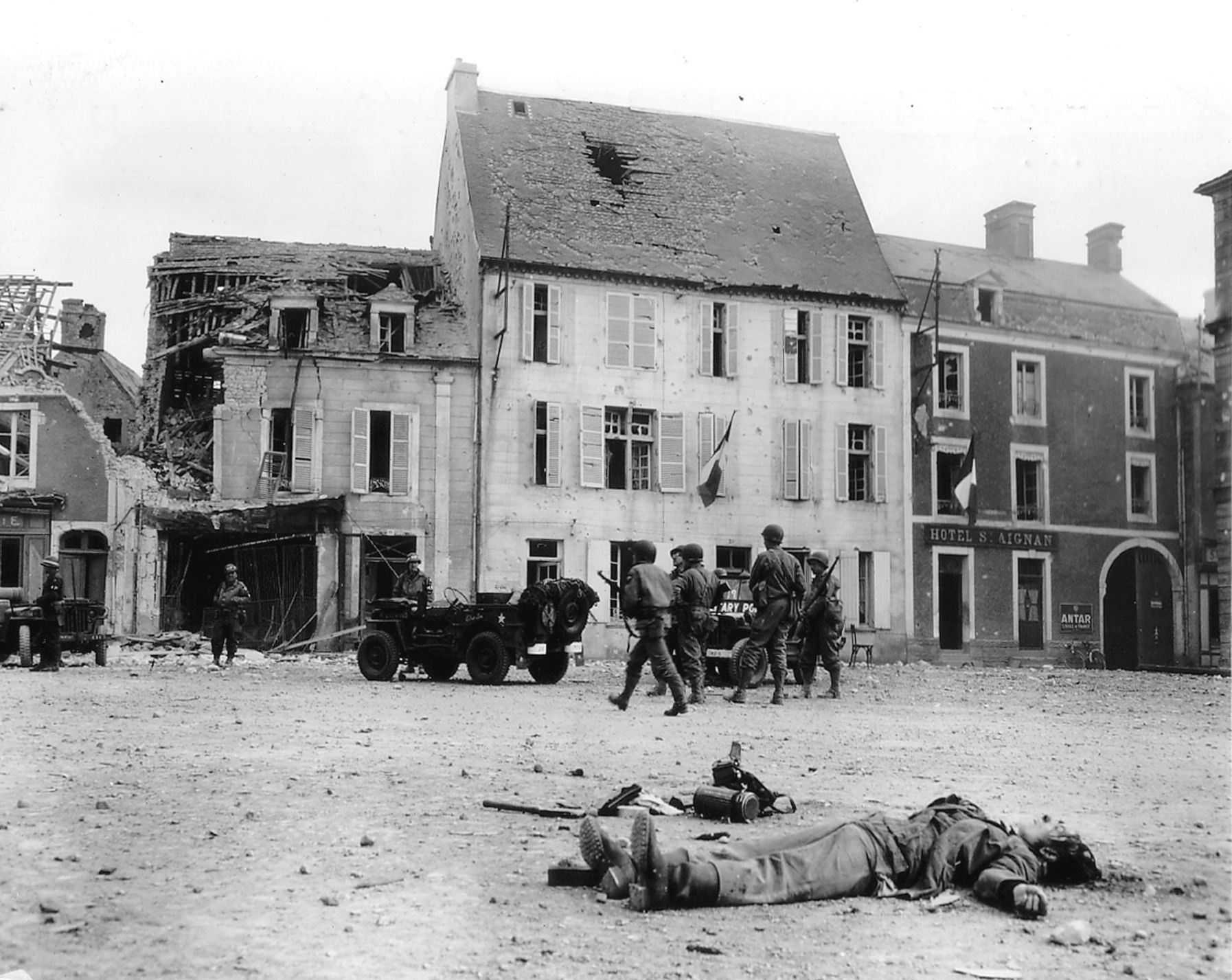 Handout photo of the body of a dead German soldier in the main square of Place Du Marche after the town was taken by U.S. troops in Trevieres