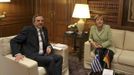 Greece's Prime Minister Antonis Samaras (L) and Germany's Chancellor Angela Merkel attend a meeting at the Maximos mansion in Athens, October 9, 2012. Merkel makes her first visit to Greece since the eurozone crisis began here three years ago. Her five-hour stop is seen by the government as a historic boost for the country's future in Europe's shared currency, but by protesters as a harbinger of more austerity and hardship. REUTERS/Thanassis Stavrakis - POOL (GREECE - Tags: POLITICS BUSINESS) Published: Říj. 9, 2012, 12:12 odp.