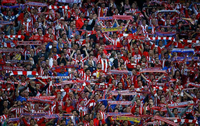 Atletico Madrid's fans watch their team play against Real Madrid during their Champions League final soccer match at the Luz Stadium in Lisbon May 24, 2014. REUTERS/Kai P