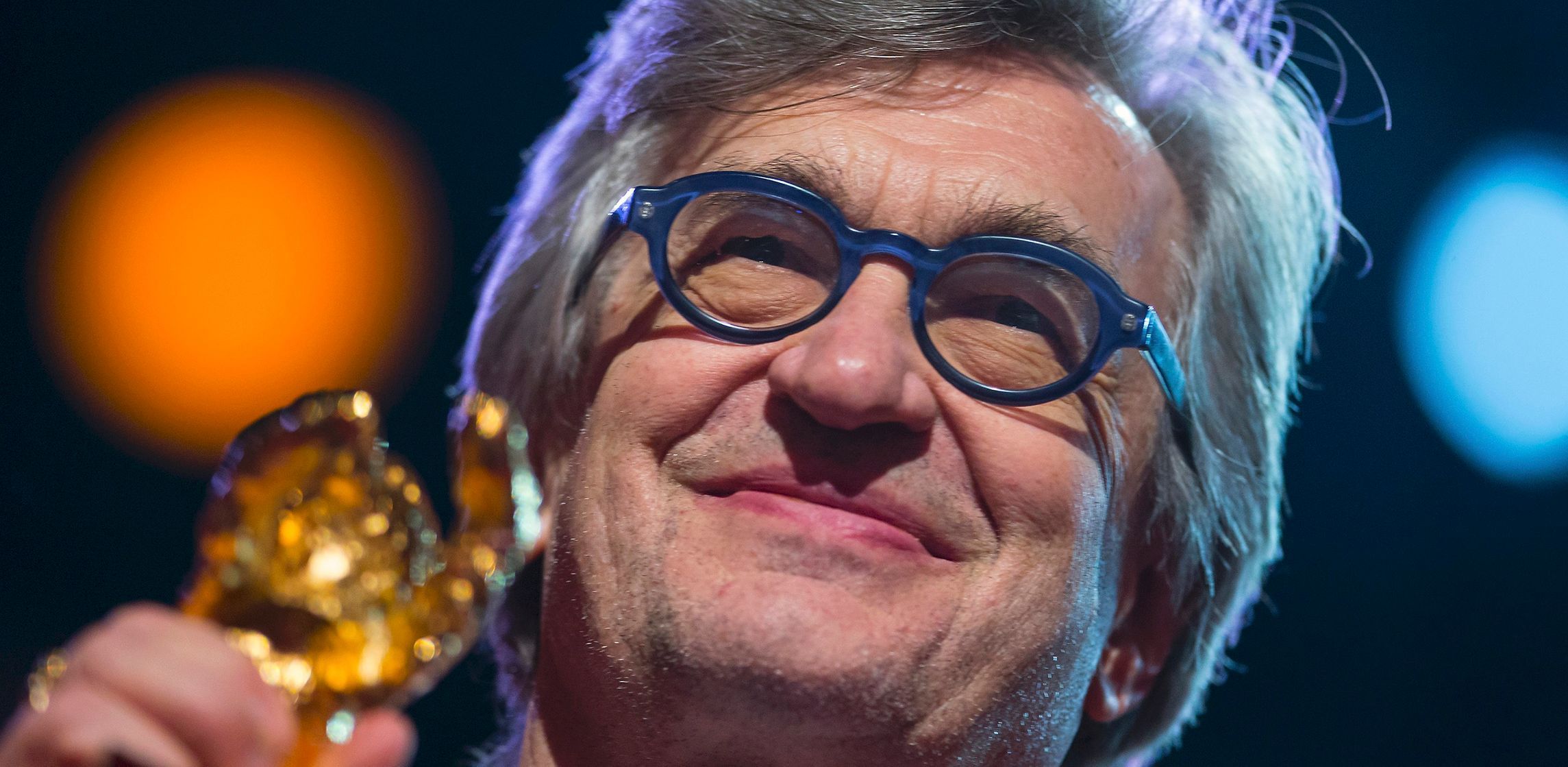 Director Wenders accepts an Honorary Golden Bear at the 65th Berlinale International Film Festival in Berlin
