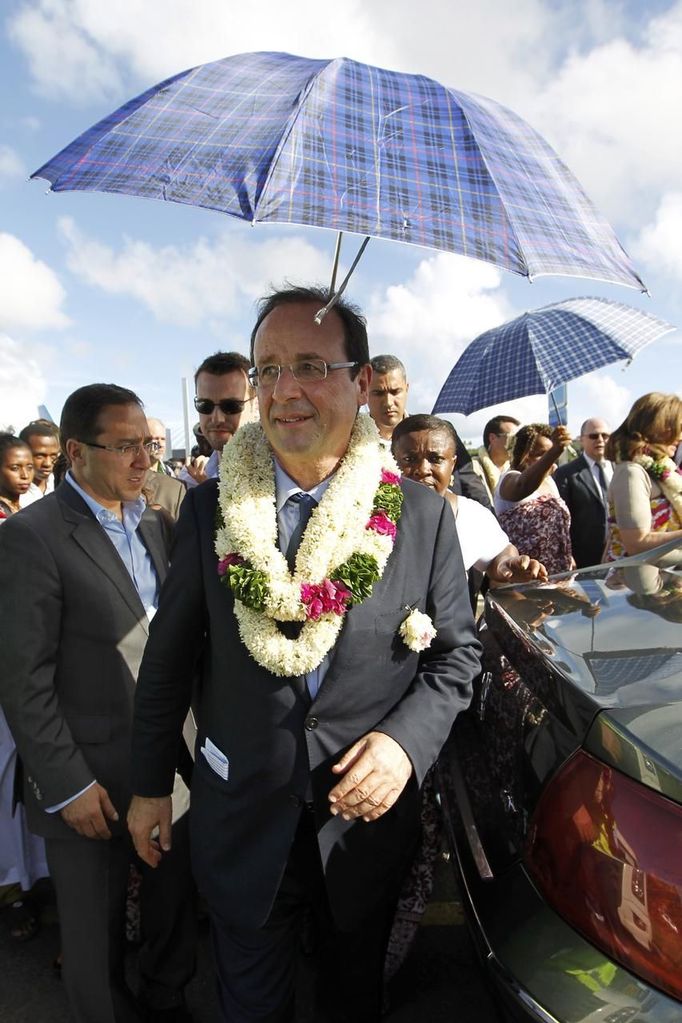 Francois Hollande, Socialist party candidate for the 2012 French presidential election, arrives at the airport in Dzaoudzi on the Indian Ocean island of Mayotte