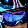 The ski jump is seen in Greece's Polychronidis' goggles as he prepares to jump during the men's ski jumping individual normal hill training event of the Sochi 2014 Winter Olympic Games in Rosa Khutor