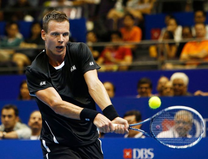 Singapore Slammers' Tomas Berdych of the Czech Republic hits a return to Manila Mavericks' Jo-Wilfried Tsonga of France during their men's singles match at the Internatio