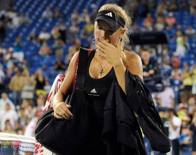 Caroline Wozniacká se loučí s diváky na US Open poté, co v 1. kole uhrála proti Rumunce Irině Camelii Beduové jen čtyři hry.