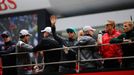 Mercedes Formula One driver Lewis Hamilton of Britain waves from a bus during the drivers' parade before the Chinese F1 Grand Prix at the Shanghai International circuit,