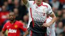 Liverpool's Gerrard celebrates scoring a penalty against Manchester United during their English Premier League soccer match in Manchester