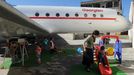 A picture taken on October 29, 2012, shows children playing near a Soviet-era Yakovlev Yak-42 plane turned into their kindergarten in the Georgian city of Rustavi, some 25 km southeast of the capital Tbilisi. Local head teacher Gari Chapidze bought the old but fully functional Yak-42 from Georgian Airways and refurbished its interior with educational equipment, games and toys but left the cockpit instruments intact so they could be used as play tools.