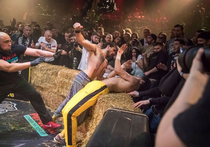 Adilzhan "Ados" Sandibekov and Yuriy Ryaboy fight during the "Top Dog" bare-knuckle boxing tournament in Moscow, Russia April 16, 2021. Picture taken April 16, 2021. REUT