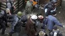 ATTENTION EDITORS - VISUAL COVERAGE OF SCENES OF INJURY OR DEATH - Anti-government protesters carry an injured man on a stretcher after violence erupted in the Independen