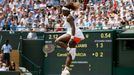 Serena Williams of the U.S. jumps as she reacts during her women's singles tennis match against Caroline Garcia of France at the Wimbledon Tennis Championships, in London