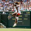 Serena Williams of the U.S. jumps as she reacts during her w