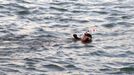 FILE - In this Saturday, Sept. 18, 2010 photo, Philllipe Croizon as he crosses the English Channel. A Frenchman whose arms and legs were amputated swam across the English Channel this weekend using leg prostheses that have flippers attached. Philippe Croizon, 42, had expected the tough crossing to take up to 24 hours and instead, he finished in only 13 and a half. (AP Photo/ Jeremy Croizon)