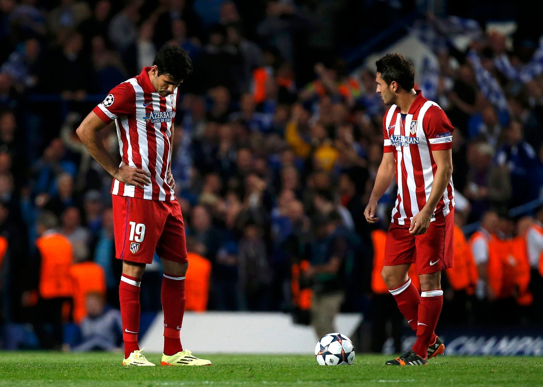 Atletico Madrid's Costa and Koke react after Chelsea scored the first goal during their Champions League semi-final second leg soccer match at Stamford Bridge Stadium in London