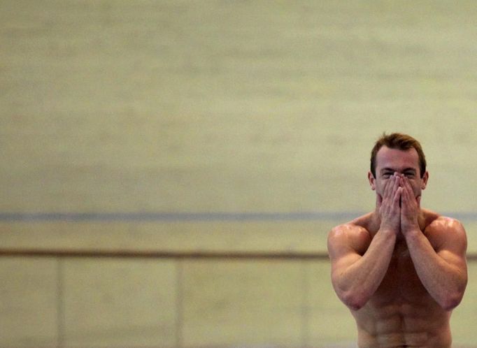 Brazilian gymnast Diego Hypolito reacts during a training session at the new Brazilian Olympic Gymnastics center in Rio de Janeiro