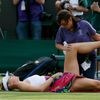 Maria Sharapova of Russia receives medical attention during