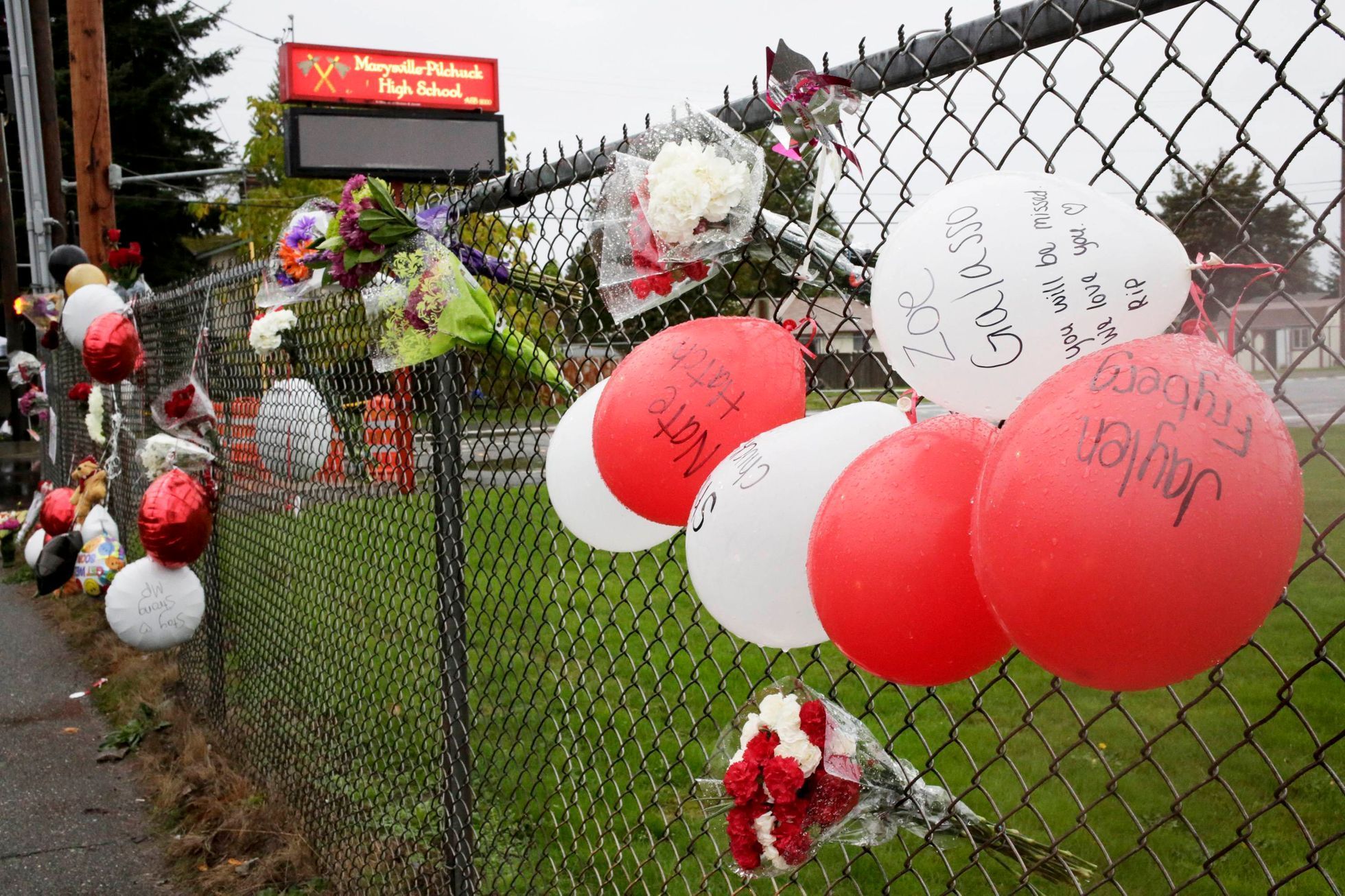 A makeshift memorial is seen outside Marysville-Pilchuck High School the day after a school shooting in Marysville