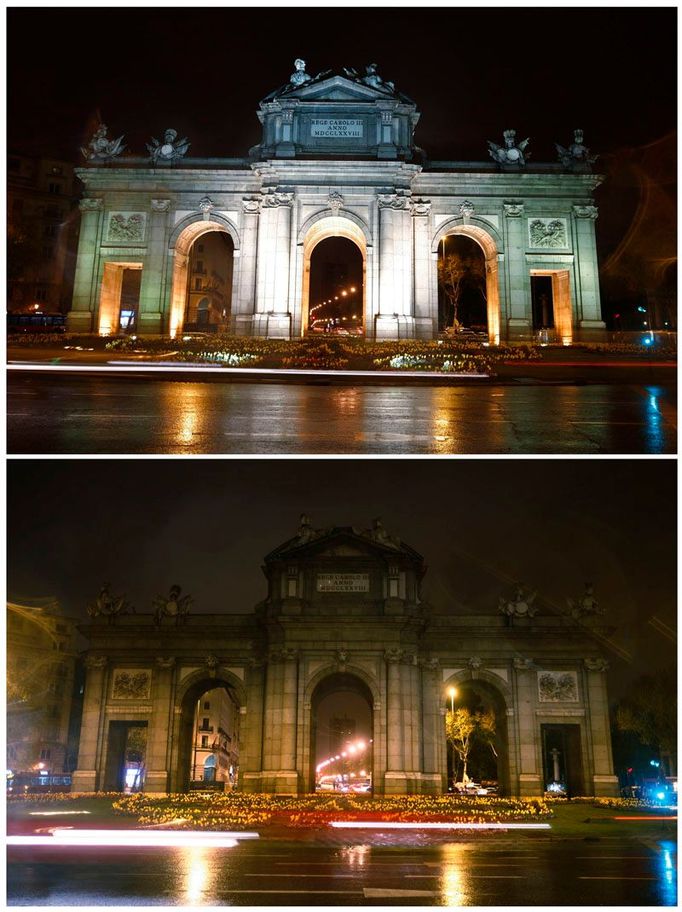 Puerta de Alcala v Madridu, Španělsko. Brána k městu před a během ekologické akce.