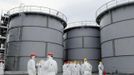 Tanks of radiation-contaminated water are seen at the Tokyo Electric Power Co (TEPCO)'s tsunami-crippled Fukushima Daiichi nuclear power plant in Fukushima prefecture, in this photo released by Kyodo March 1, 2013, ahead of the second-year anniversary of the March 11, 2011 earthquake and tsunami. Mandatory Credit REUTERS/Kyodo (JAPAN - Tags: DISASTER ANNIVERSARY BUSINESS) ATTENTION EDITORS - THIS IMAGE HAS BEEN SUPPLIED BY A THIRD PARTY. IT IS DISTRIBUTED, EXACTLY AS RECEIVED BY REUTERS, AS A SERVICE TO CLIENTS. FOR EDITORIAL USE ONLY. NOT FOR SALE FOR MARKETING OR ADVERTISING CAMPAIGNS. JAPAN OUT. NO COMMERCIAL OR EDITORIAL SALES IN JAPAN. YES Published: Bře. 1, 2013, 2:27 odp.