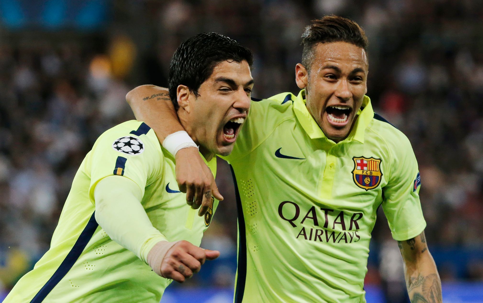 Football: Luis Suarez (L) celebrates with Neymar after scoring the second goal for Barcelona