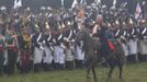 Participants in period costume re-enact the battle of Borodino during anniversary celebrations at the Borodino museum-reserve outside Moscow September 2, 2012. Russian President Vladimir Putin made a rousing call for unity among Russia's diverse ethnic and religious groups on Sunday as he led commemorations of a battle 200 years ago that led to the defeat of Napoleon Bonaparte. REUTERS/Sergei Karpukhin (RUSSIA - Tags: ANNIVERSARY POLITICS CONFLICT) Published: Zář. 2, 2012, 7:49 odp.