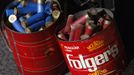 Old coffee cans of shotgun shells are dropped off by someone trading in unwanted guns to the Los Angeles County Sheriff's Department at the 'Gifts for Guns' gun buyback in Compton, California, January 21, 2013. People can trade in their guns anonymously and with no questions asked in exchange for $200 gift cards for assault weapons, $100 gift cards for shotguns, handguns and rifles, and $50 for non-operational firearms. U.S. President Barack Obama is pushing to address controversial issues surrounding gun violence and regulation as he begins his second term in office. REUTERS/David McNew (UNITED STATES - Tags: POLITICS SOCIETY CRIME LAW) Published: Led. 21, 2013, 11:20 odp.