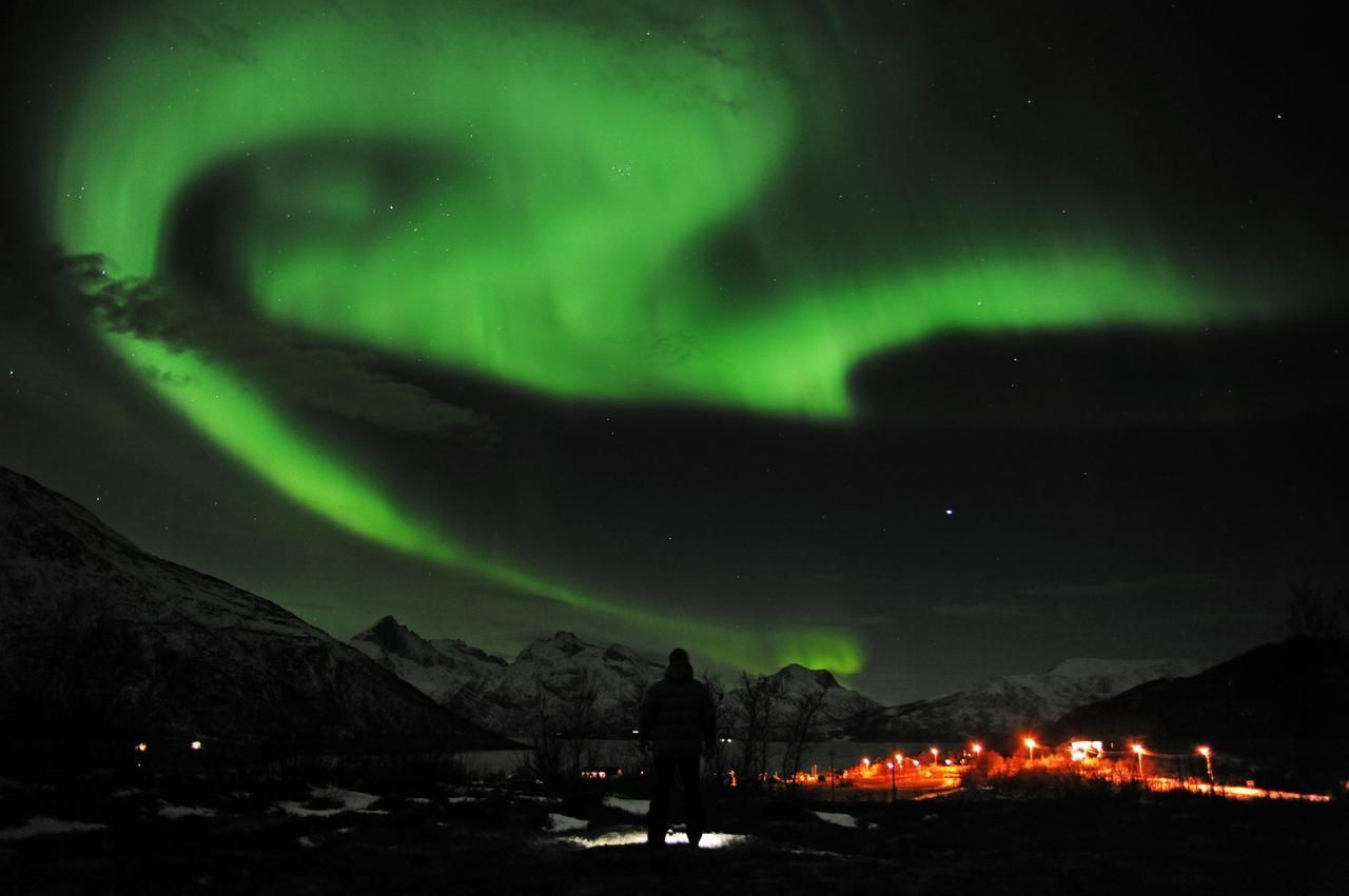 Polární záře z 24. ledna 2012 nad Tromsoe na severu Norska
