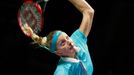 Petra Kvitova of the Czech Republic serves against Maria Sharapova of Russia during their WTA Finals singles tennis match at the Singapore Indoor Stadium October 23, 2014