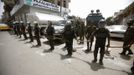 Riot policemen stand guard outside the French embassy in Sanaa September 20, 2012. A French magazine ridiculed the Prophet Mohammad on Wednesday by portraying him naked in cartoons, threatening to fuel the anger of Muslims around the world who are already incensed by a California-made video depicting him as a lecherous fool. REUTERS/Khaled Abdullah (YEMEN - Tags: POLITICS CIVIL UNREST RELIGION) Published: Zář. 20, 2012, 10:54 dop.